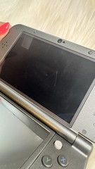 New Nintendo 3DS XL Metallic Black – Includes Charger, 2 Games and Carrying Case