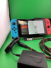 Nintendo Switch – w/ Neon Red & Neon Blue Joy-Con In Good Condition (T41)