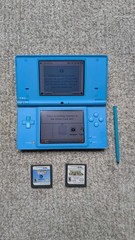 Nintendo DSi Light Blue Handheld Console Game System w/ Charger & 2 Games