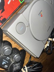 Sony Playstation 1 Gray Console With Games Controllers, A/V Cable, and Power