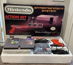 Nintendo NES Action Set Bundle Box 2 Controllers Zapper 3 Games TMNT Dr. Mario