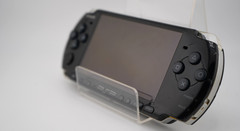 Sony PSP-3000 Console with OEM Battery, Game, 64GB SD, Case Bundle – Piano Black
