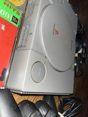 Sony Playstation 1 Gray Console With Games Controllers, A/V Cable, and Power