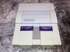 Nintendo SNES Console – Includes 2 controllers, RCA Cable, Power cable and Game.