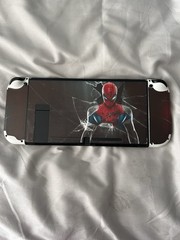 Nintendo Switch 32GB 720p HD Handheld Console w/ Spider-Man Joy-Con Skin, Grips