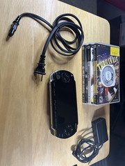 Sony PSP-1001 32 mb console with 4 games
