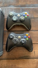 Microsoft Xbox 360 E 4GB Black Console Bundle, 2 Wireless Controllers