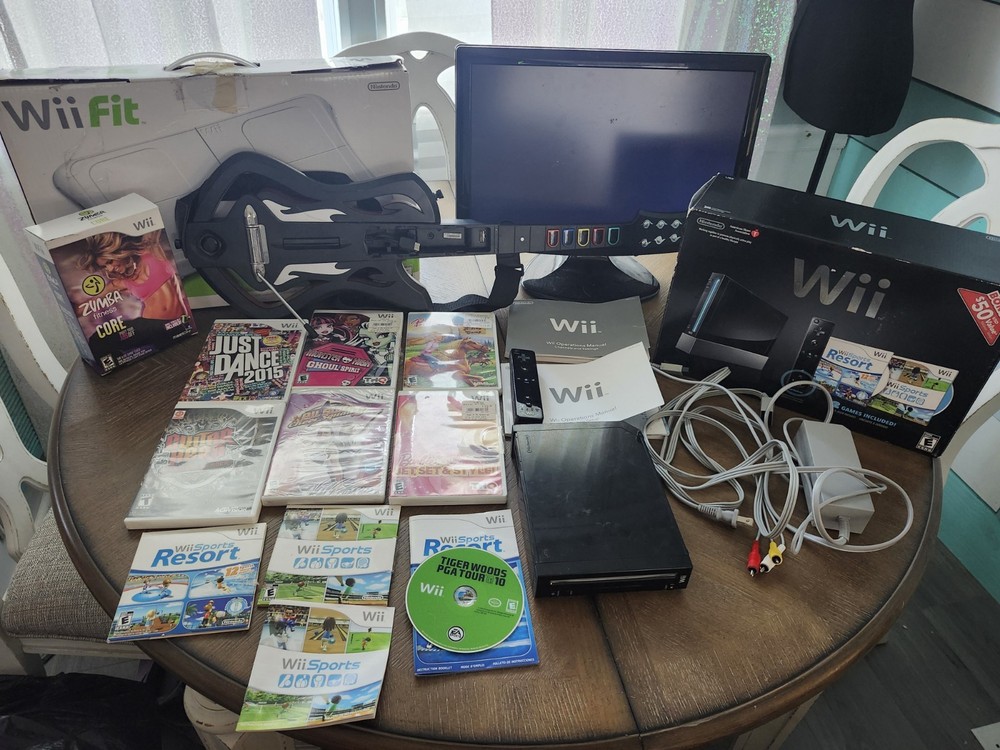 Wii Console in box bundle Wii Sports and Wii Sports Resort Guitar Hero wii fit