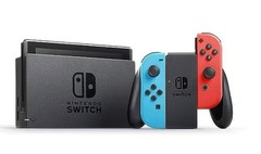 EUC! Nintendo Switch Bundle with stand, charger, BONUS extra controller.