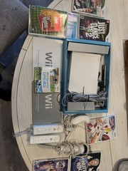 Wii Console with Wii Sports Six Other Games Two Controllers and One Nunchuck