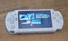 White Psp 2000 With Charger. The System Has Been Tested And Works Great.