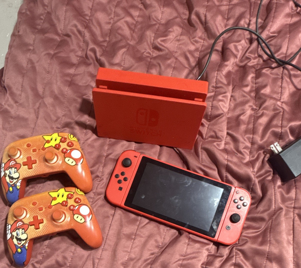 Nintendo Switch Oled comes with everything+2 Mario controllers asking $300 OBO
