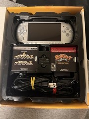 Sony PSP-3000 Silver Ratchet & Clank Size Matters Entertainment Pack Wi-Fi 1GB