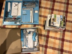 Nintendo Wii with assortment of games bundle – Original Packaging included
