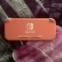 Nintendo Switch Lite Coral Console with eShop $20 Card & Switch Online 12 Month