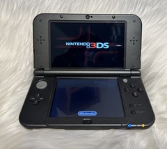 New Nintendo 3DS XL Metallic Black – Includes Charger, 2 Games and Carrying Case