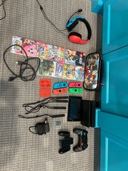Nintendo mega lot. Includes controllers, the Nintendo switch, headset, and more