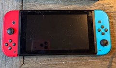 EUC! Nintendo Switch Bundle with stand, charger, BONUS extra controller.