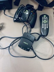 Xbox console, three controllers, carryting case, 2 games, and more