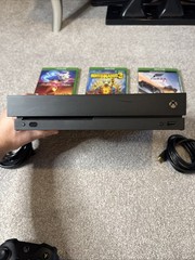 Microsoft Xbox One X 1TB console bundle w/ 3 games & controller – Functional