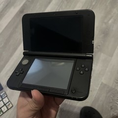 Nintendo 3DS XL Handheld Console – Red / Black (Model SPR-001) Charger/4 Games
