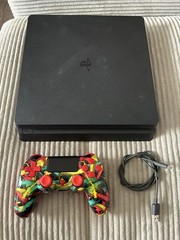 Sony PlayStation 4 Slim 1TB Console – Jet Black