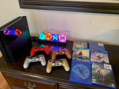 Sony PlayStation 4 500gb Jet Black Console With Two Controllers and Four games