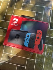 Nintendo Switch 32GB Gray Console with Neon Red and Neon Blue Joy-Con