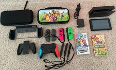 Nintendo Switch Bundle – Controllers, Mario’s Games, Travel Case, More!