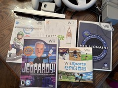 Nintendo Wii Console Bundle with Two Remotes & 3 Games And Wii Fit Board