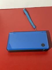 NINTENDO DSI XL BLUE FOR PARTS OR REPAIR NOT WORKING CRACKED SCREEN