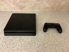 Sony PlayStation 4 Slim 1TB Console – Jet Black