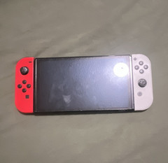 Nintendo Switch Handheld Console w/ Red & White Joy-Con, Black, USB-C