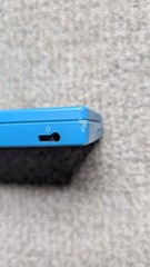 Nintendo DSi Light Blue Handheld Console Game System w/ Charger & 2 Games