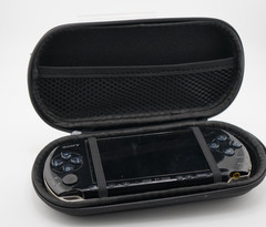 Sony PSP-3000 Console with OEM Battery, Game, 64GB SD, Case Bundle – Piano Black